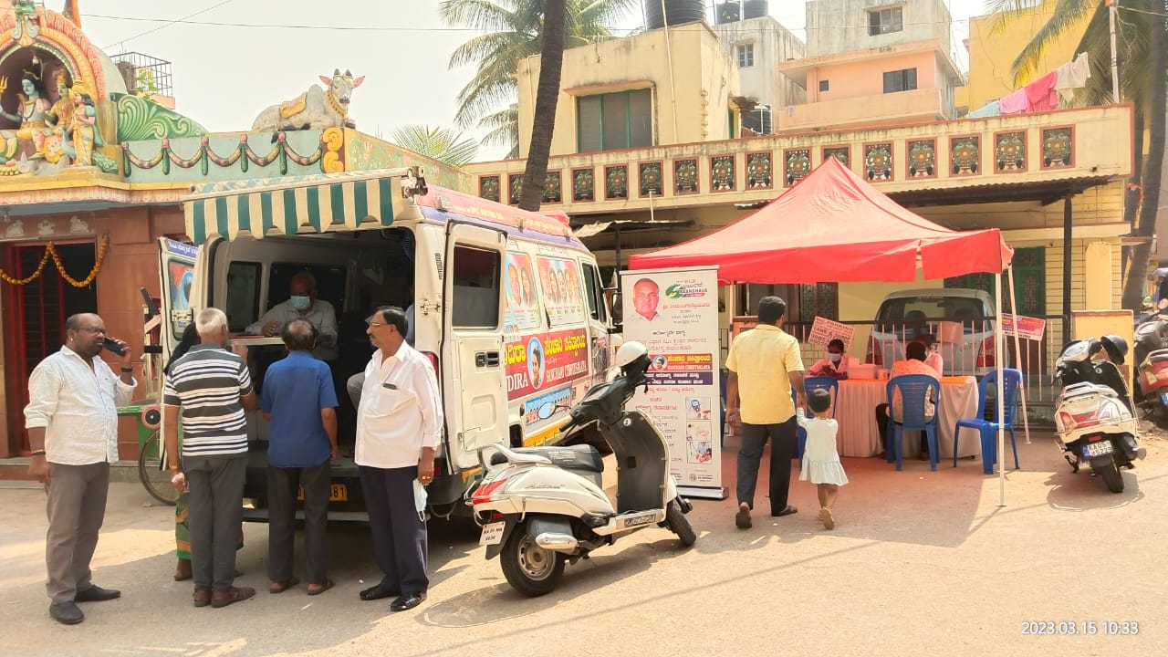 Medical team checking patients at health camp